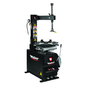 Semi-automatic swing-arm tyre changer machine in a fitment bay